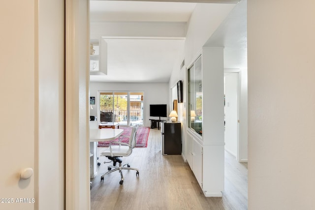 office area with light hardwood / wood-style flooring