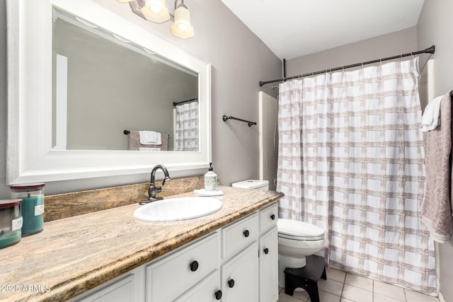 bathroom featuring walk in shower, tile patterned flooring, vanity, and toilet