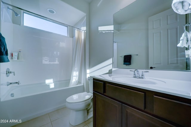 full bathroom featuring vanity, tile patterned flooring, toilet, and shower / tub combo with curtain