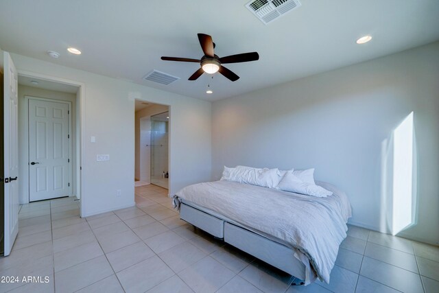 bedroom featuring ceiling fan and light tile patterned floors