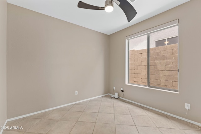 41627 N Cedar Chase Rd, Anthem, AZ 85086 - empty room featuring a ceiling fan, baseboards, and tile patterned floors