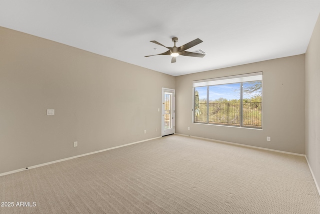 41627 N Cedar Chase Rd, Anthem, AZ 85086 - unfurnished room with a ceiling fan, baseboards, and light carpet