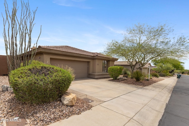41627 N Cedar Chase Rd, Anthem, AZ 85086 - ranch-style home with stucco siding, driveway, and a garage