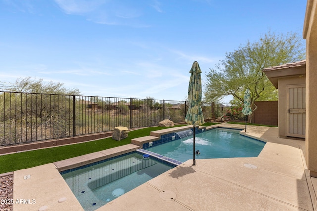 41627 N Cedar Chase Rd, Anthem, AZ 85086 - view of swimming pool featuring a fenced backyard, a pool with connected hot tub, and a patio area
