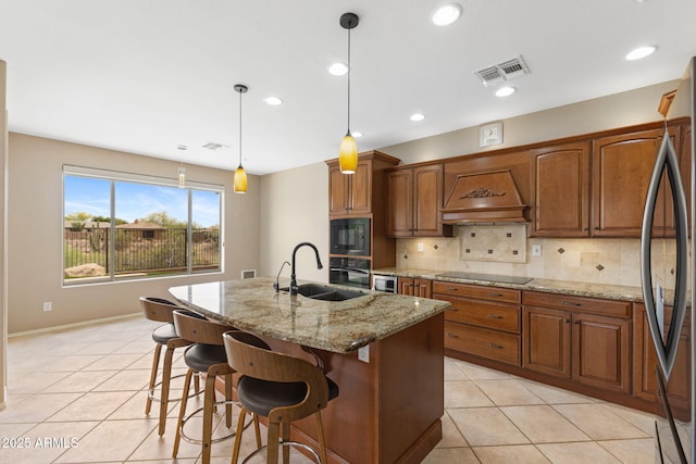 41627 N Cedar Chase Rd, Anthem, AZ 85086 - kitchen with a sink, black appliances, light tile patterned flooring, premium range hood, and tasteful backsplash