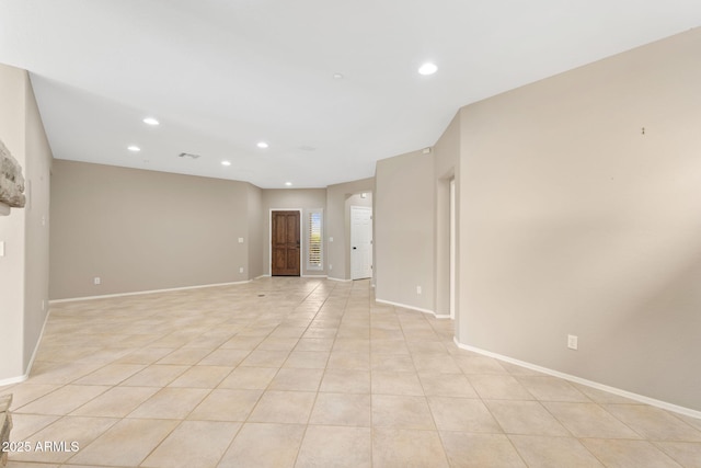 41627 N Cedar Chase Rd, Anthem, AZ 85086 - empty room with recessed lighting, light tile patterned floors, and baseboards