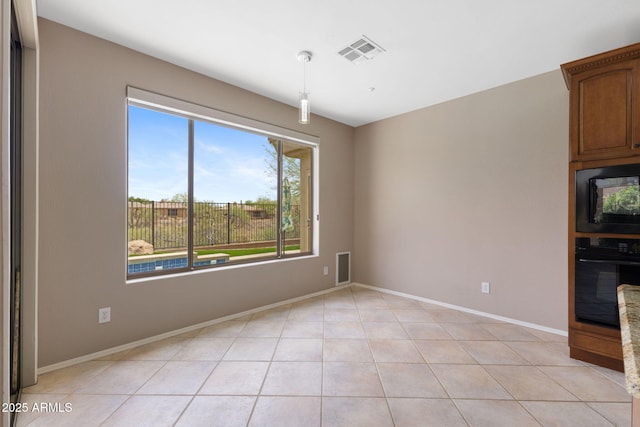 41627 N Cedar Chase Rd, Anthem, AZ 85086 - spare room featuring baseboards and light tile patterned floors