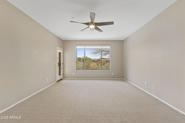 41627 N Cedar Chase Rd, Anthem, AZ 85086 - empty room featuring ceiling fan, light colored carpet, and baseboards