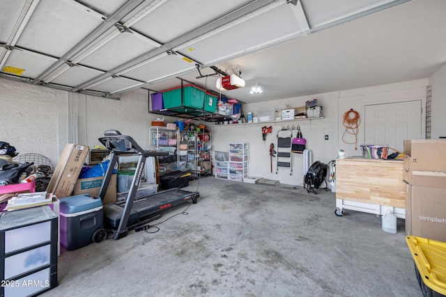 garage featuring a garage door opener
