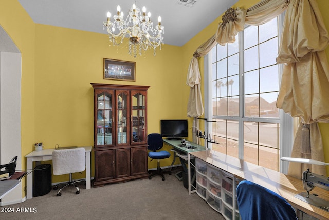 office space with carpet flooring, a wealth of natural light, and a notable chandelier