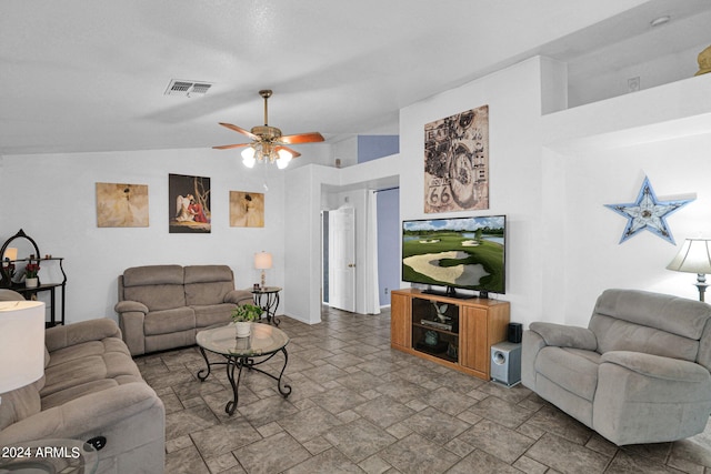 living room with ceiling fan and lofted ceiling