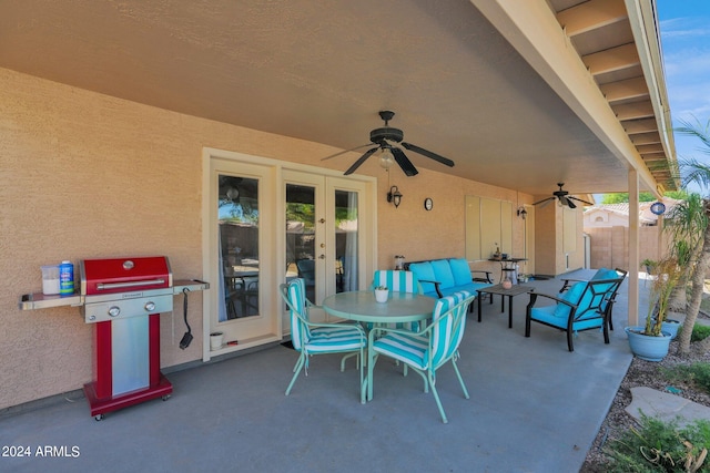 view of patio / terrace featuring ceiling fan and grilling area