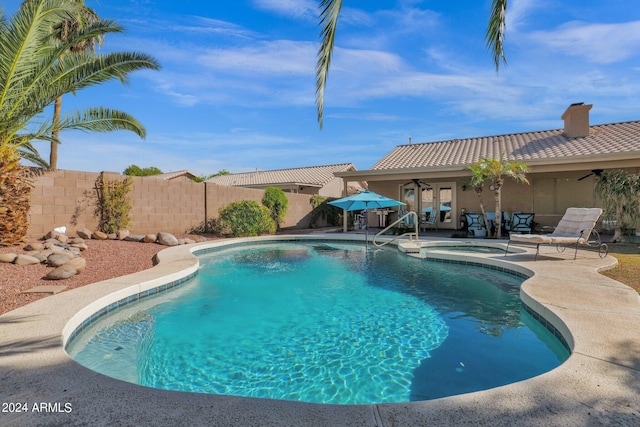 view of pool featuring a patio