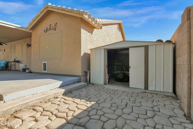 property entrance with a patio