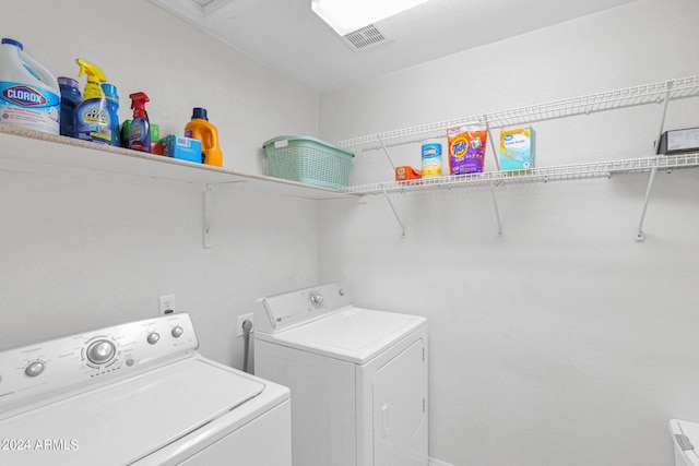 laundry area with washer and dryer