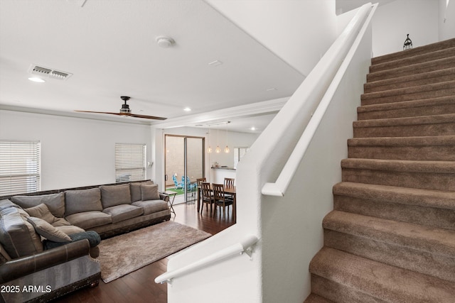 living room with dark wood-style floors, recessed lighting, visible vents, stairway, and ceiling fan