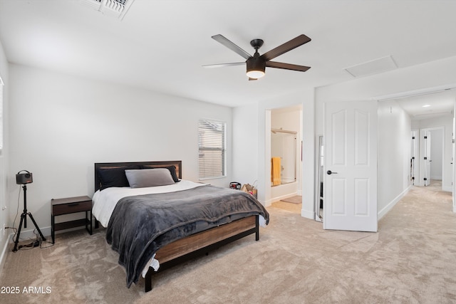 bedroom featuring visible vents, baseboards, attic access, and light colored carpet