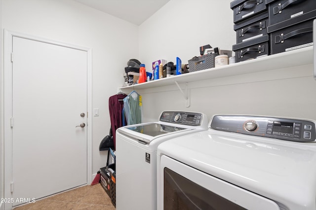 washroom with laundry area, independent washer and dryer, and light tile patterned floors