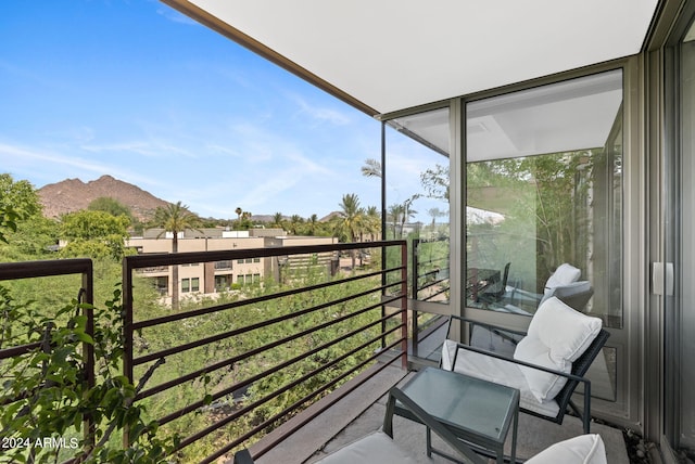 balcony featuring a mountain view