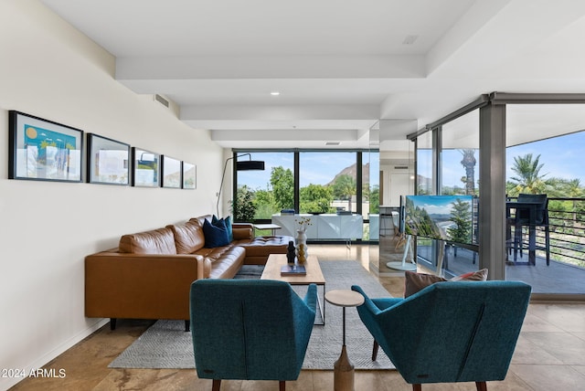 living room with floor to ceiling windows