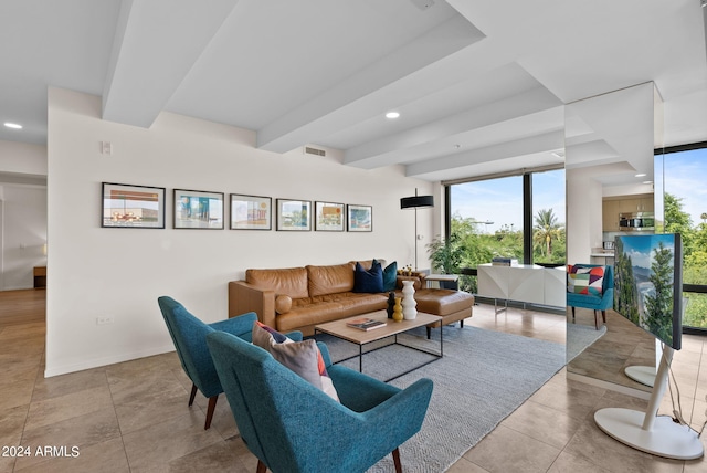 living room with beam ceiling