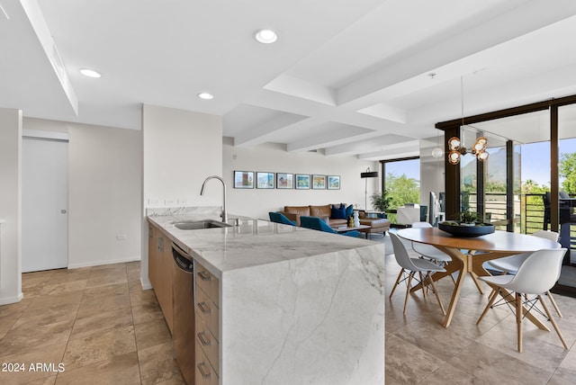 kitchen with beam ceiling, sink, dishwasher, an inviting chandelier, and light stone counters