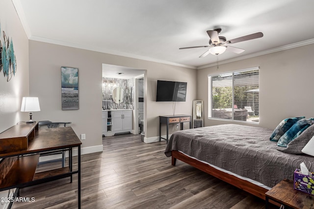 bedroom with crown molding, wood finished floors, baseboards, ensuite bathroom, and ceiling fan