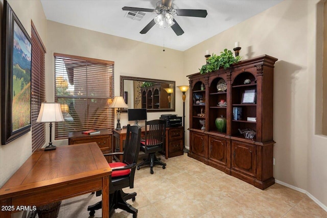 office featuring ceiling fan and light tile patterned floors