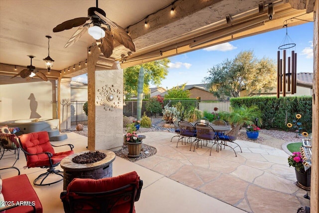 view of patio / terrace with an outdoor fire pit