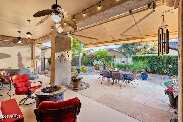 view of patio / terrace with a fire pit