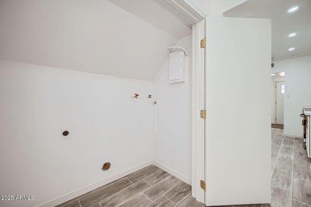 laundry area with recessed lighting, wood tiled floor, hookup for an electric dryer, laundry area, and baseboards