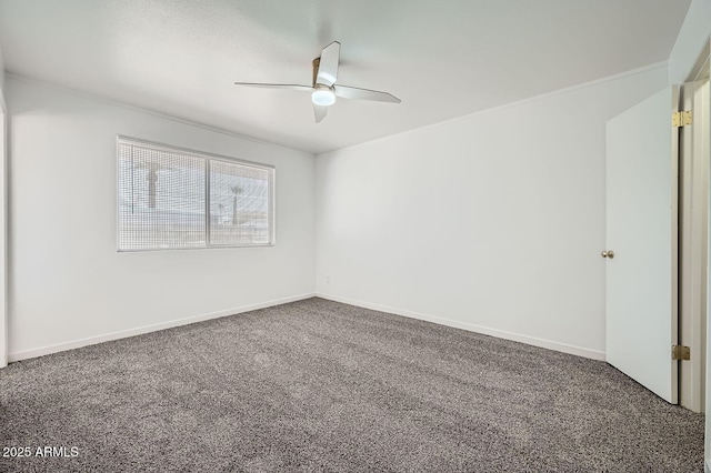 unfurnished room with carpet flooring, ceiling fan, and baseboards