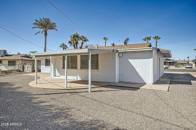 rear view of house featuring a patio area