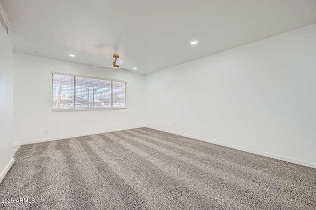 unfurnished room featuring carpet floors, baseboards, and recessed lighting