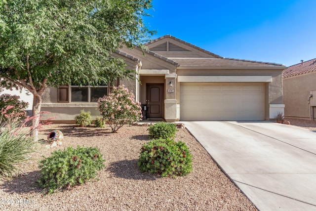 4741 E Fire Opal Ln, San Tan Valley, AZ 85143 - single story home with an attached garage, concrete driveway, a tiled roof, and stucco siding