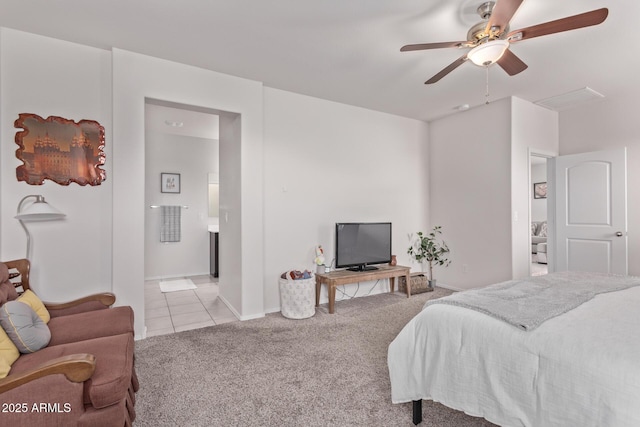 4741 E Fire Opal Ln, San Tan Valley, AZ 85143 - tiled bedroom with carpet flooring, baseboards, ensuite bathroom, and a ceiling fan