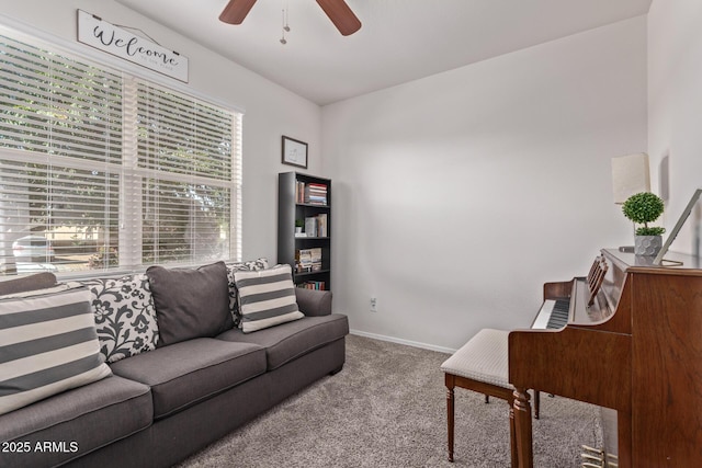 4741 E Fire Opal Ln, San Tan Valley, AZ 85143 - living room with carpet floors, ceiling fan, and baseboards