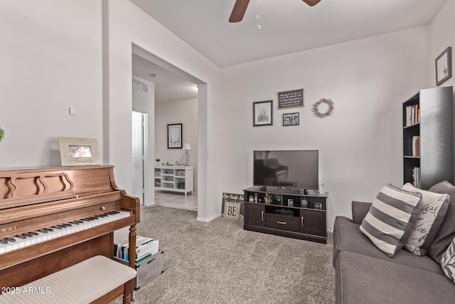 4741 E Fire Opal Ln, San Tan Valley, AZ 85143 - living area featuring carpet floors, ceiling fan, and baseboards