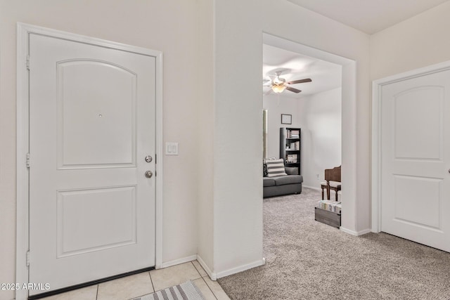 4741 E Fire Opal Ln, San Tan Valley, AZ 85143 - foyer entrance featuring ceiling fan, light colored carpet, and baseboards