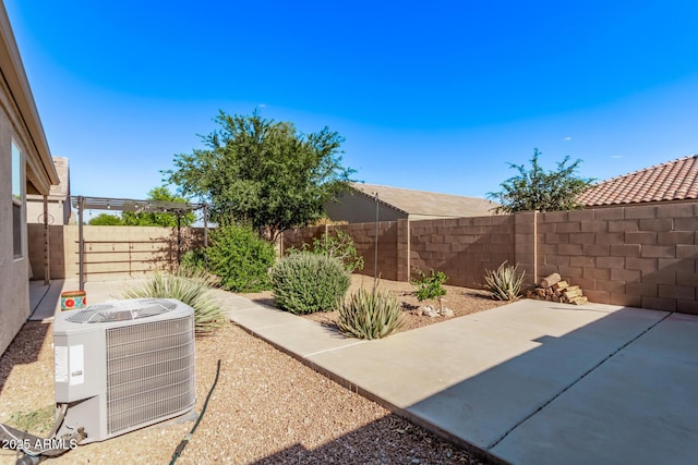 4741 E Fire Opal Ln, San Tan Valley, AZ 85143 - fenced backyard featuring central AC and a patio