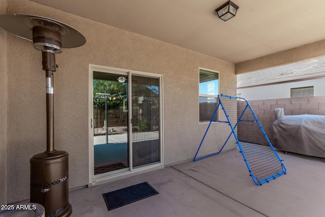 4741 E Fire Opal Ln, San Tan Valley, AZ 85143 - property entrance featuring stucco siding and a patio area