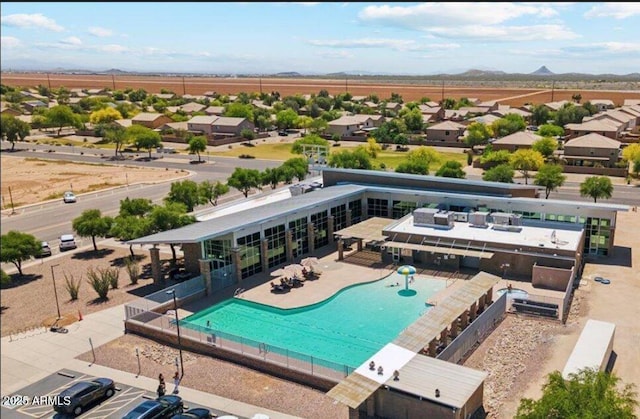 4741 E Fire Opal Ln, San Tan Valley, AZ 85143 - community pool with a mountain view, a patio area, and a residential view
