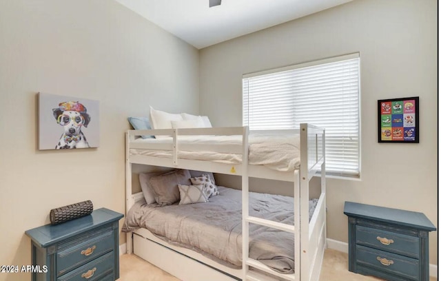 bedroom with light carpet