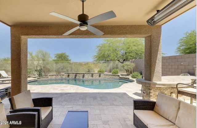 view of pool featuring a patio area and ceiling fan