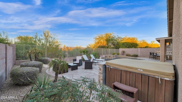 view of patio with a hot tub