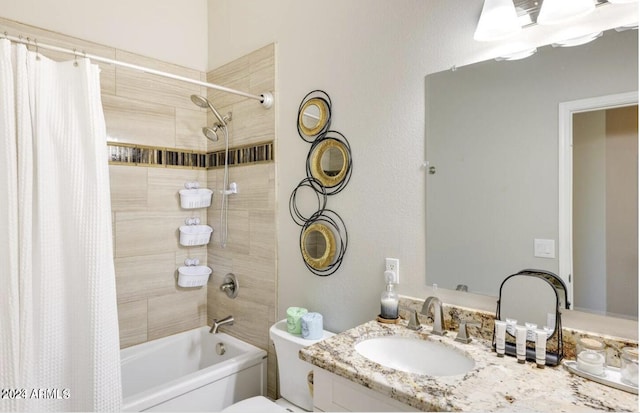 full bathroom featuring toilet, vanity, and shower / bath combination with curtain