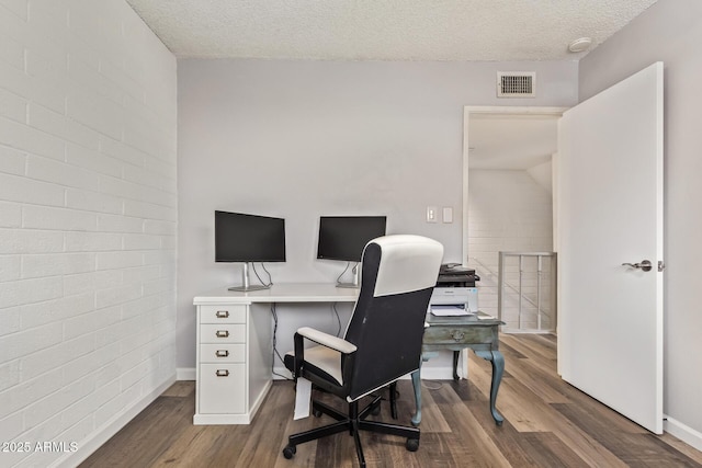 8538 E Portland St, Scottsdale, AZ 85257 - office space with wood finished floors, a textured ceiling, and baseboards