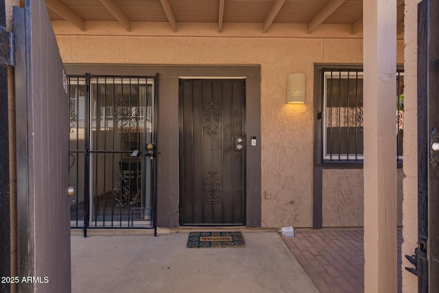 8538 E Portland St, Scottsdale, AZ 85257 - view of exterior entry with stucco siding