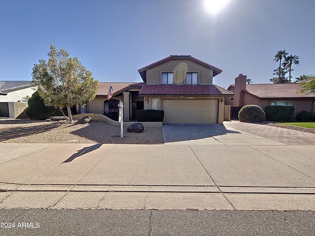 view of front of property featuring a garage