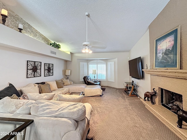 carpeted living room with ceiling fan, a textured ceiling, and vaulted ceiling